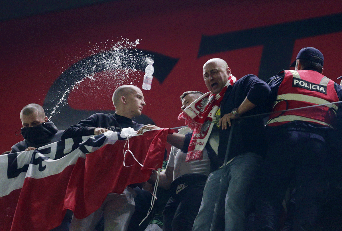 Albania fans fans clash with local police during the match against Poland at Arena Kombetare, Tirana, Albania  