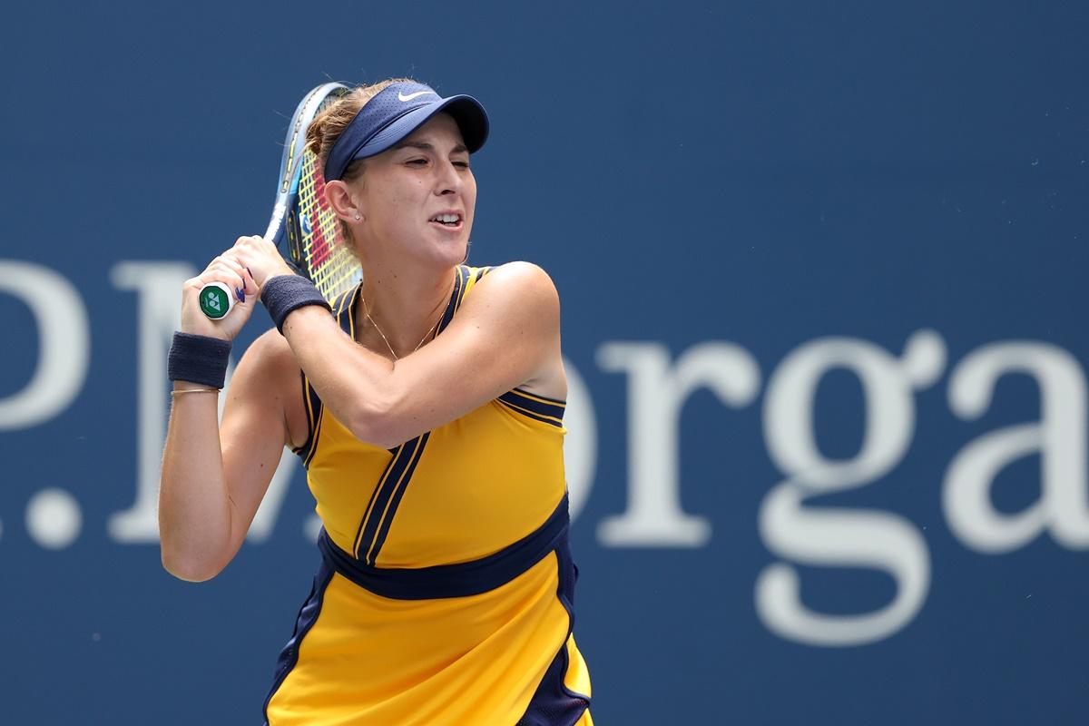 Switzerland's Belinda Bencic returns the ball against Arantxa Rus of Netherlands.