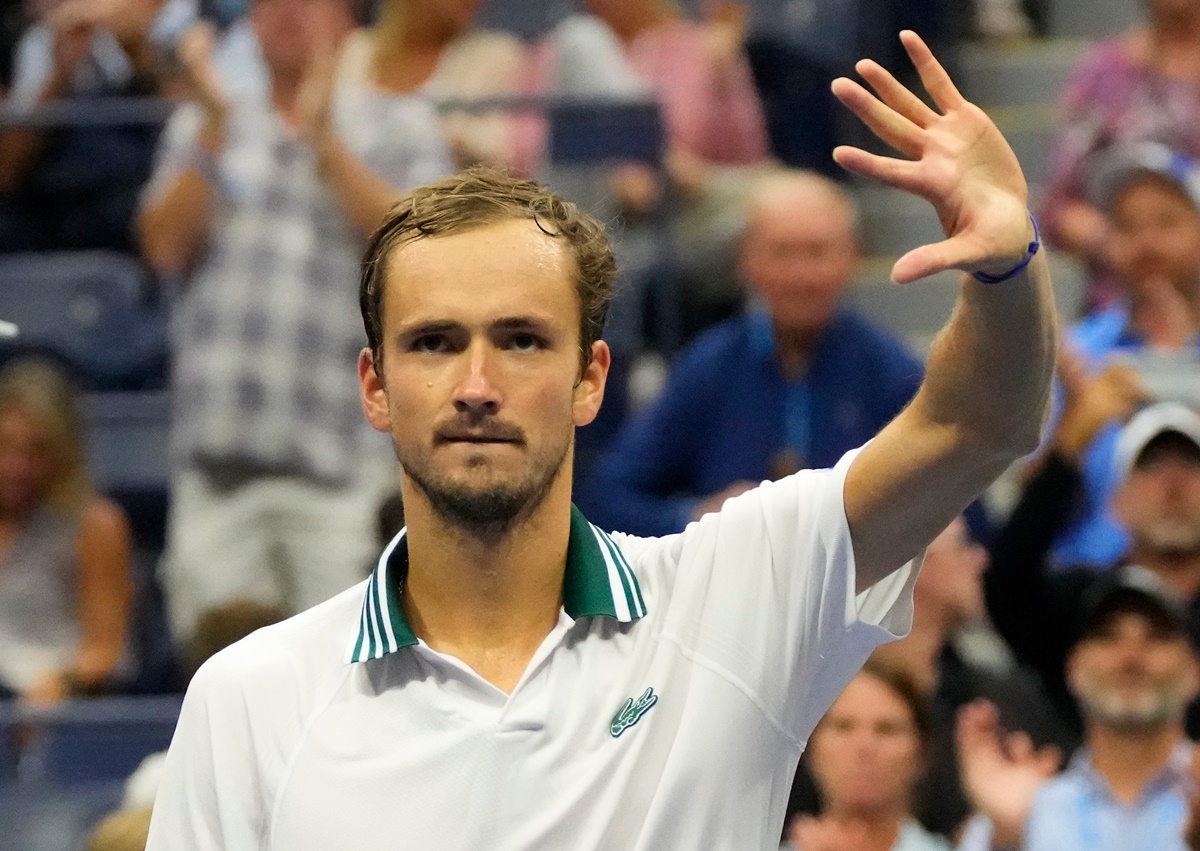 Russia's Daniil Medvedev waves to the crowd after beating Germany's Dominik Koepfer. 