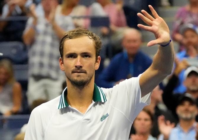 Russia's Daniil Medvedev waves to the crowd after beating Germany's Dominik Koepfer. 