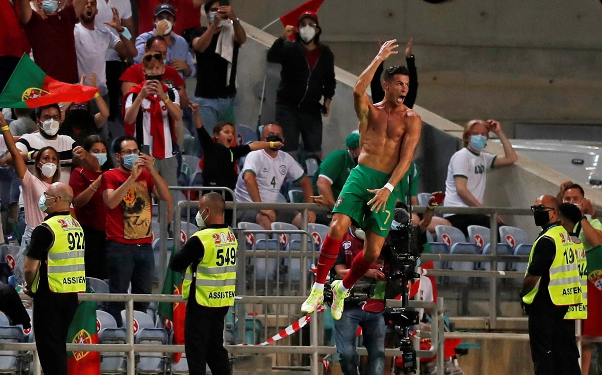 Cristiano Ronaldo celebrates scoring Portugal's second goal against the Republic of Ireland in the World Cup Group A UEFA qualifier