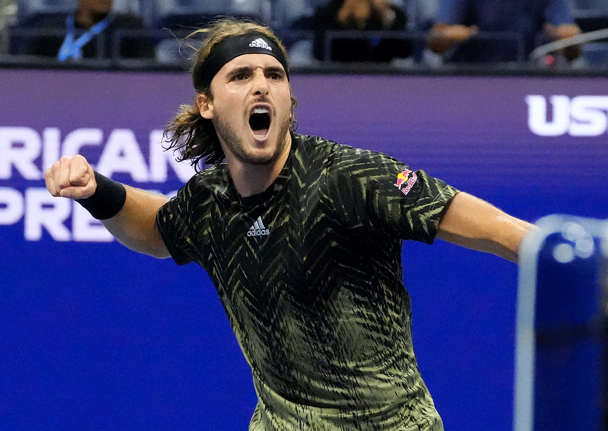 Greece's Stefanos Tsitsipas celebrates after winning a break point in the 4th set against France's Adrian Mannarino at the USTA Billie King National Tennis Center.