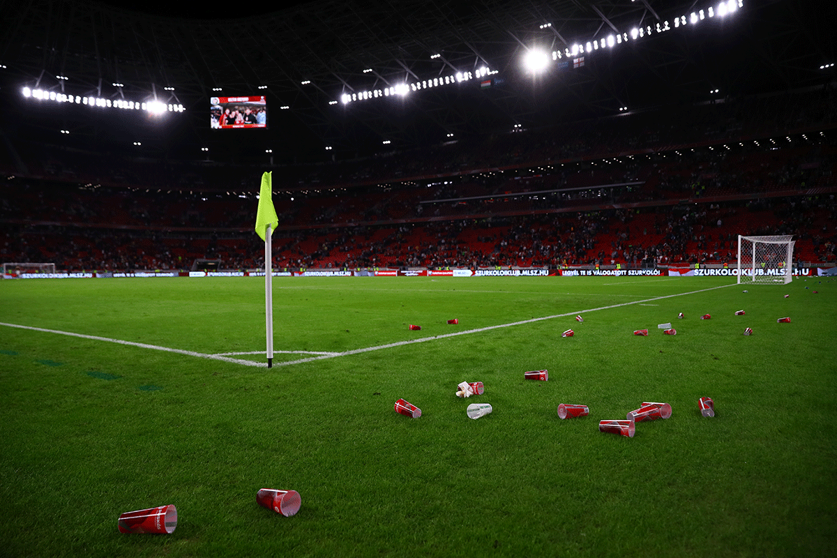 Plastic cups seen on the pitch after the World Cup qualifying match between Hungary and England at Puskas Arena, Budapest on Thursday