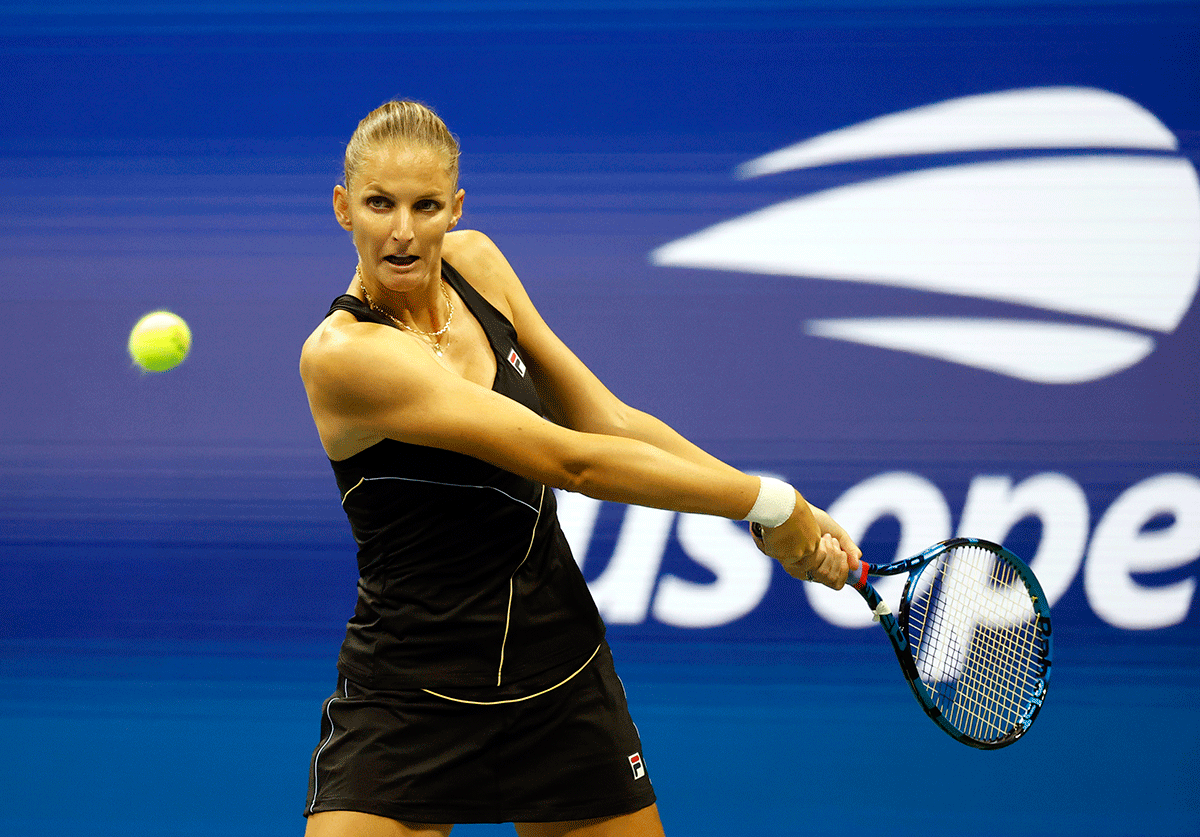 Czech Republic's Karolina Pliskova hits a shot against USA's Amanda Anisimova in their second round match