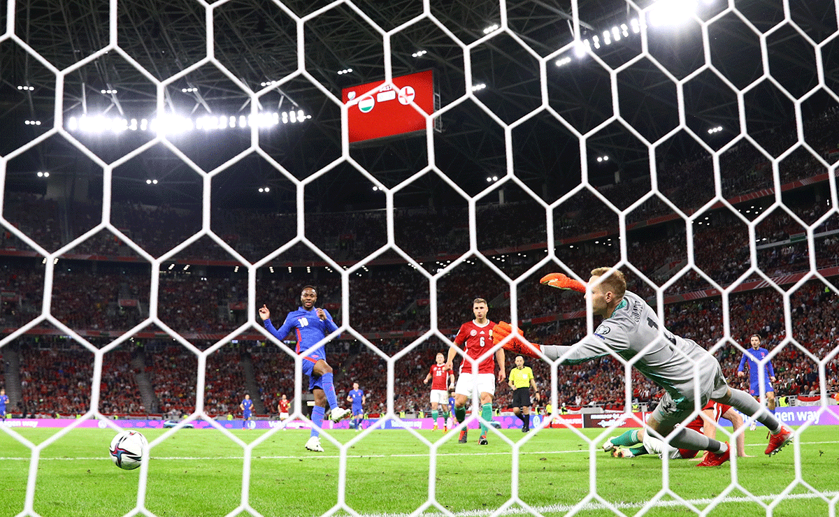 England's Raheem Sterling scores their first goal against Hungary at Puskas Arena, Budapest