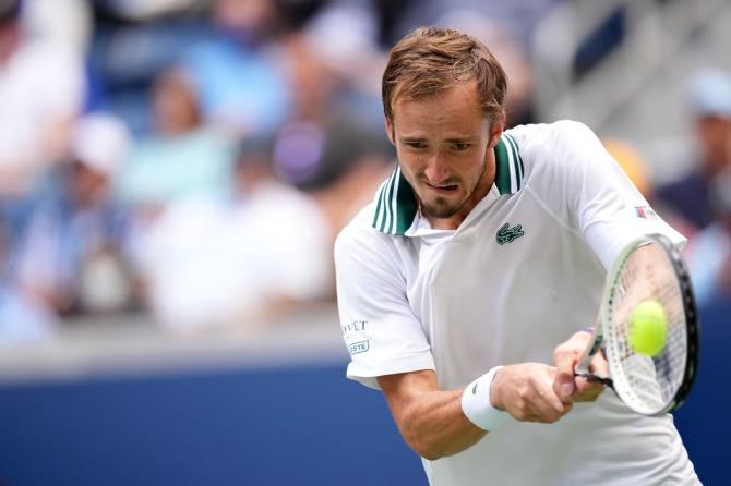 Russia's Daniil Medvedev makes a backhand return to Spain's Pablo Andujar.