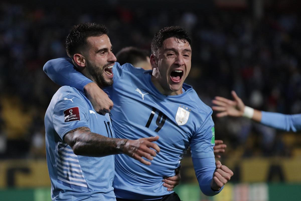 Uruguay's Gaston Pereiro celebrates with Joaquiin Piquerez Moreira after scoring the match-winner in Thursday's South American World Cup qualifier against Ecuador, at Estadio Campeon del Siglo, Montevideo, Uruguay.