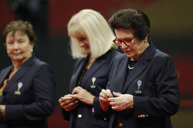 Billie Jean King, right, and Valerie Ziegenfuss, centre, look at their rings at the ceremony honouring the induction of the 'Original 9' into the International Tennis Hall of Fame on Thursday, Day 11 of the 2021 US Open.