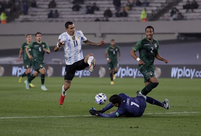 Argentina's Angel Di Maria is thwarted by Bolivia's Carlos Lampe