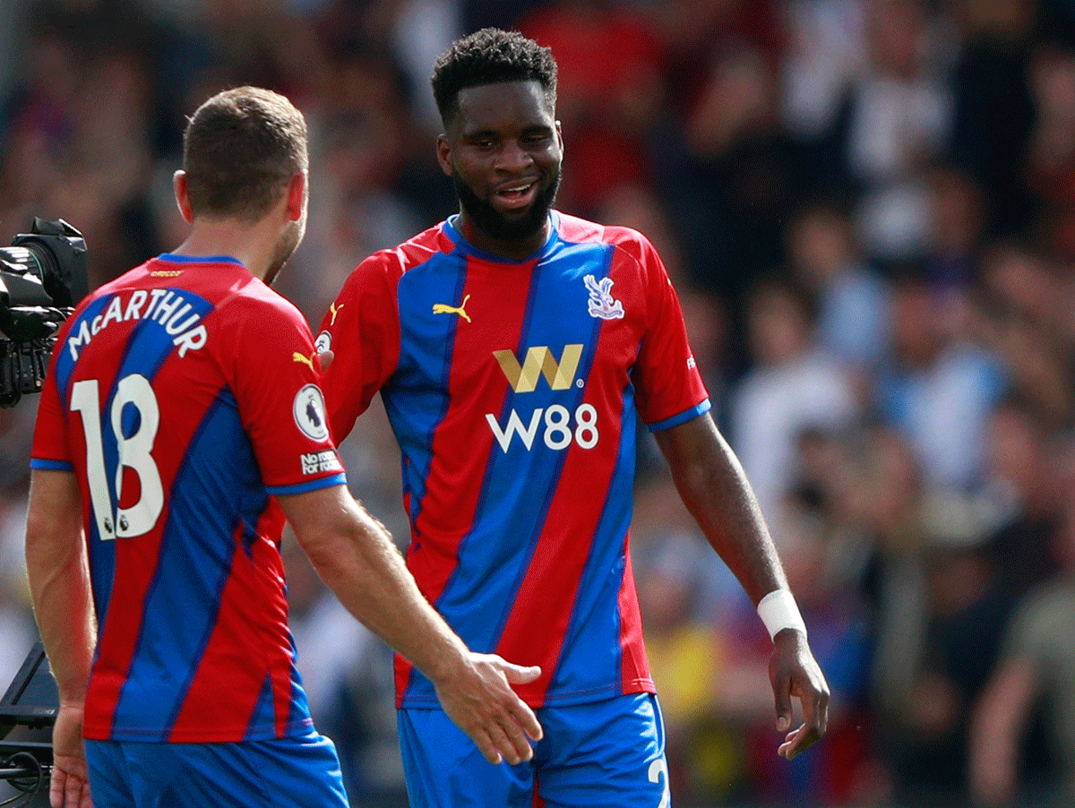 Crystal Palace's Odsonne Edouard and James McArthur celebrate after the match against Tottenham Hotspur at Selhurst Park in London on Saturday
