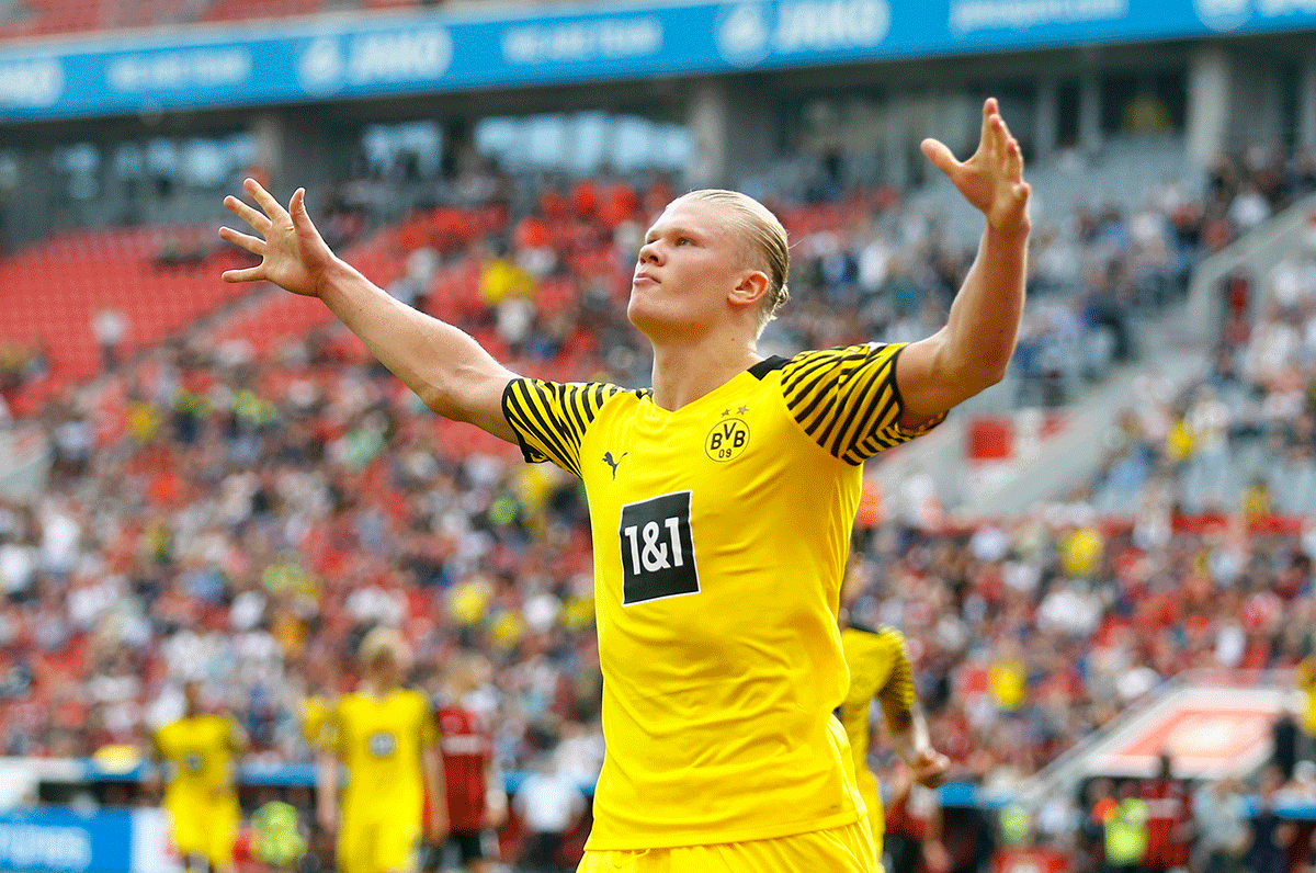 Borussia Dortmund's Erling Haaland celebrates scoring their fourth goal against Bayer Leverkusen at BayArena in Leverkusen