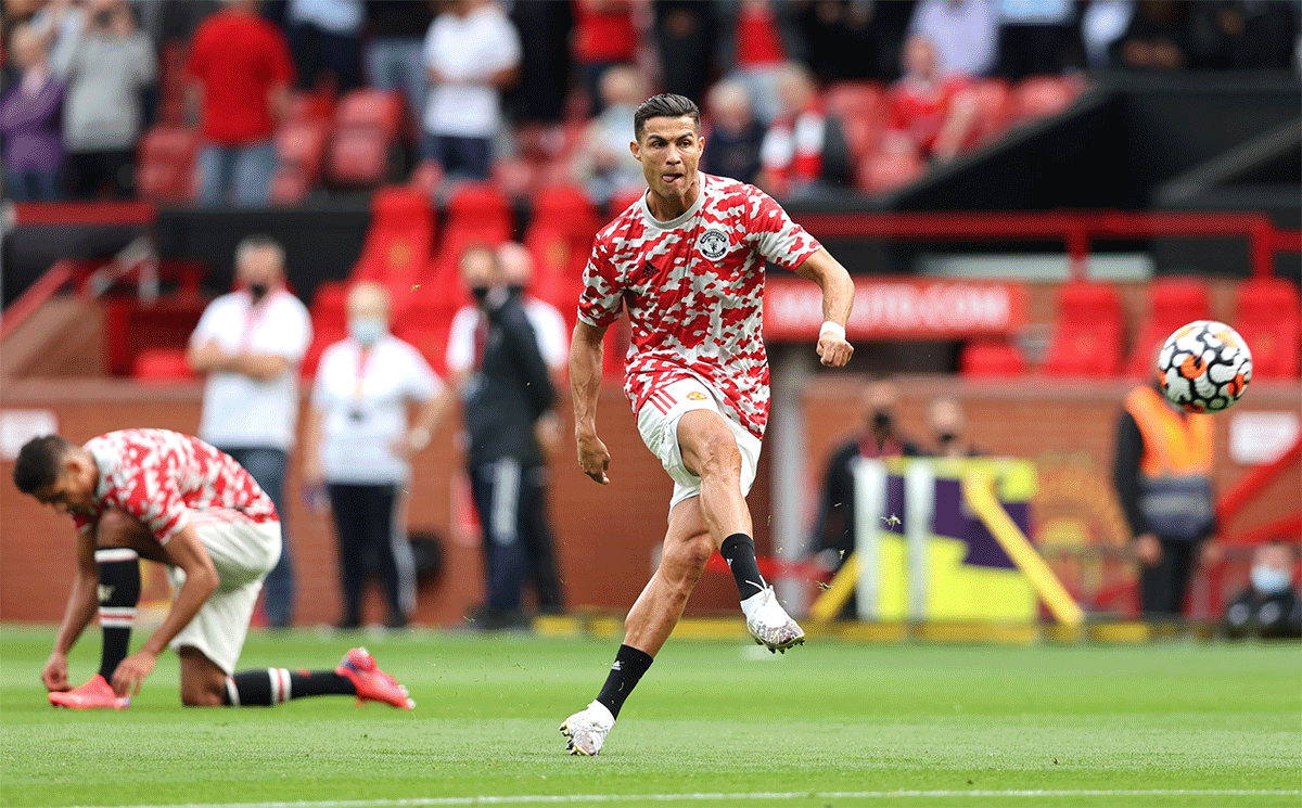 Cristiano Ronaldo warms up ahead of the EPL match against Newcastle at Old Trafford on Saturday