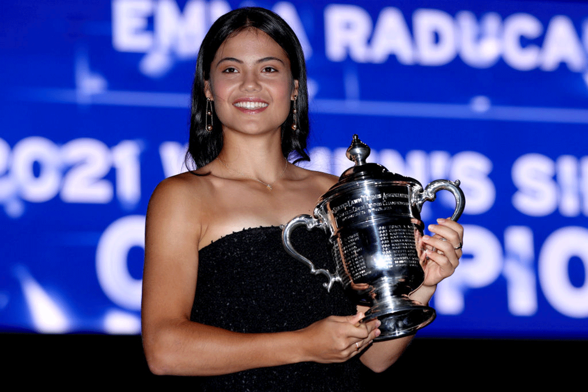 Great Britain's Emma Raducanu poses with the championship trophy after defeating Canada's Leylah Annie Fernandez to win the US Open women's singles final at the USTA Billie Jean King National Tennis Center at Flushing Meadows in New York City, New York on Saturday 