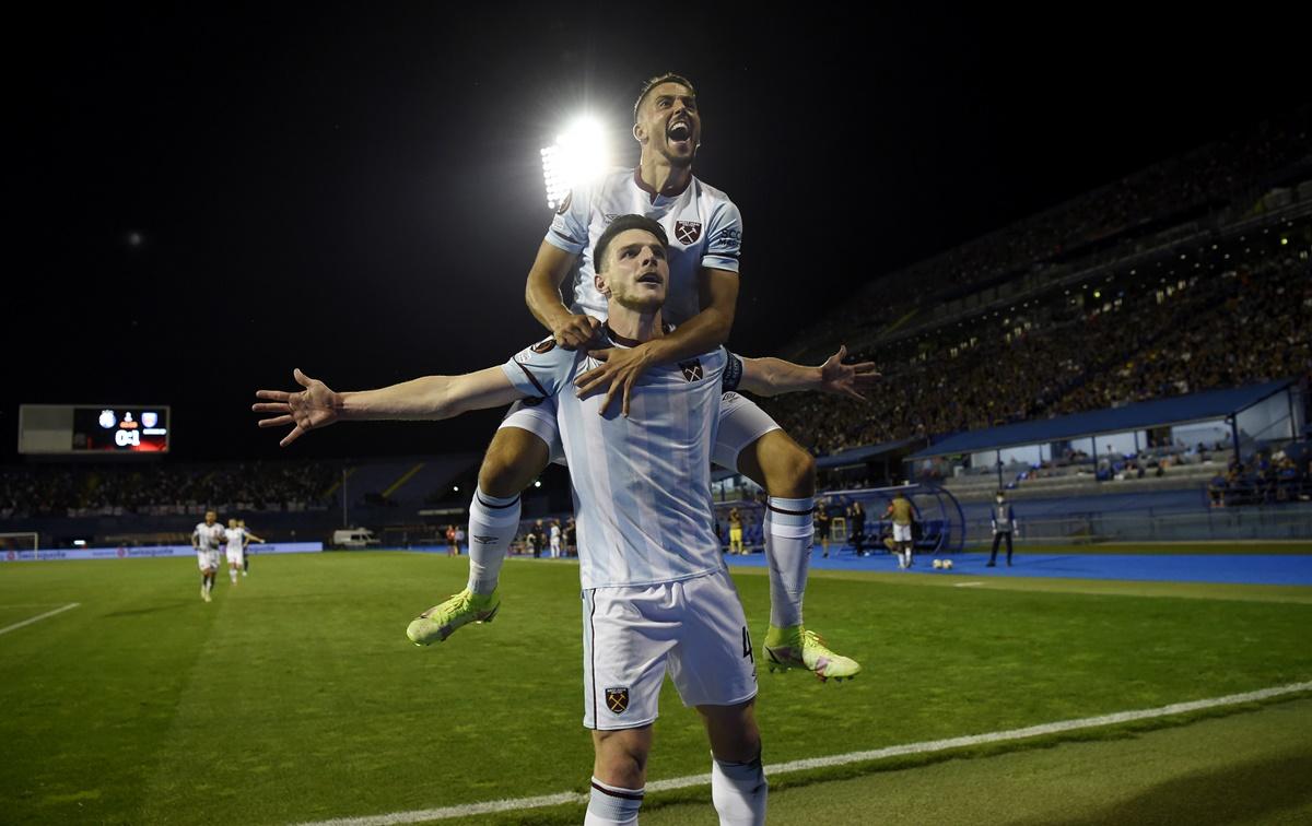 Declan Rice celebrates with Manuel Lanzini after scoring West Ham United's second goal during the UEFA Europa League Group H match against Dinamo Zagreb, at Maksimir Stadium in Zagreb, Croatia, on Thursday. 