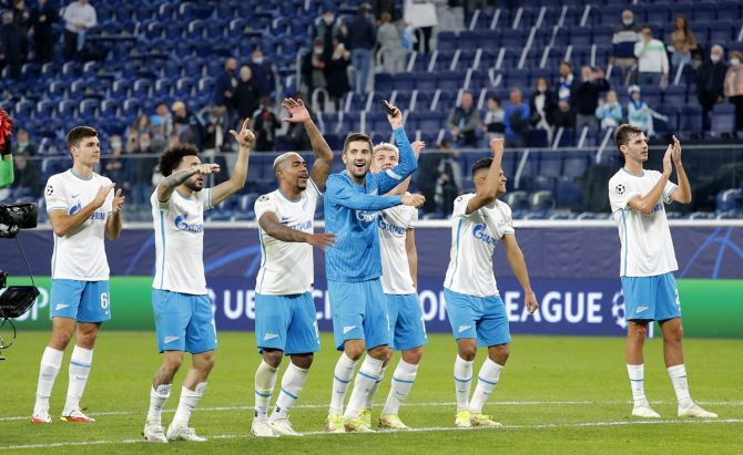 Zenit Saint Petersburg players celebrate with their fans after victory over Malmo in the  Champions League Group H match, at Gazprom Arena, in Saint Petersburg, Russia.