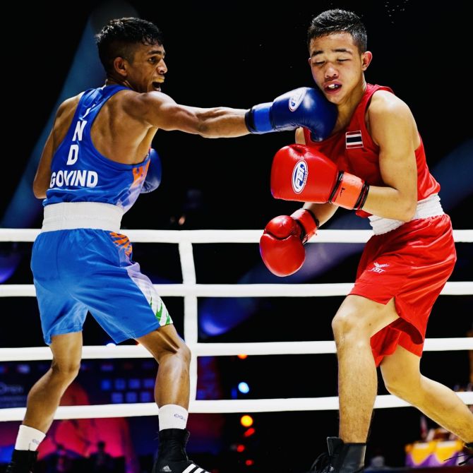 India’s Govind Sahani in action against Korea’s Natthaphon Thuamcharoen in the 48kg bout at the Thailand Open in Phuket on Saturday.