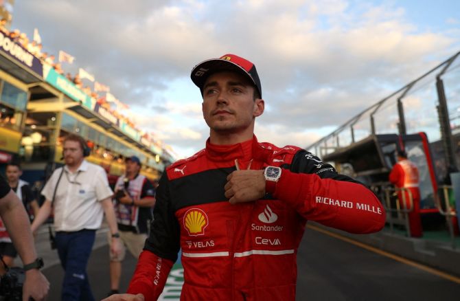 Ferrari's Charles Leclerc reacts as he walks back after placing first in qualifying for the Australian Grand Prix at Melbourne Grand Prix Circuit, on Saturday.