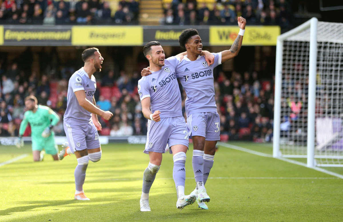 Leeds United's Jack Harrison celebrates with teammates Crysencio Summerville after scoring against Watford at Vicarage Road in Watford