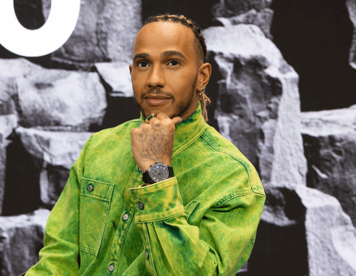 Lewis Hamilton told reporters after finishing fourth for Mercedes in Melbourne that he would not be shedding his ear piercings and a nose stud.