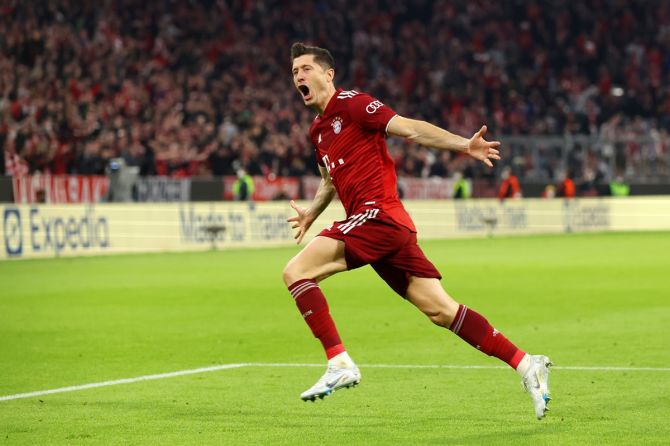 Robert Lewandowski celebrates putting Bayern Munich ahead.