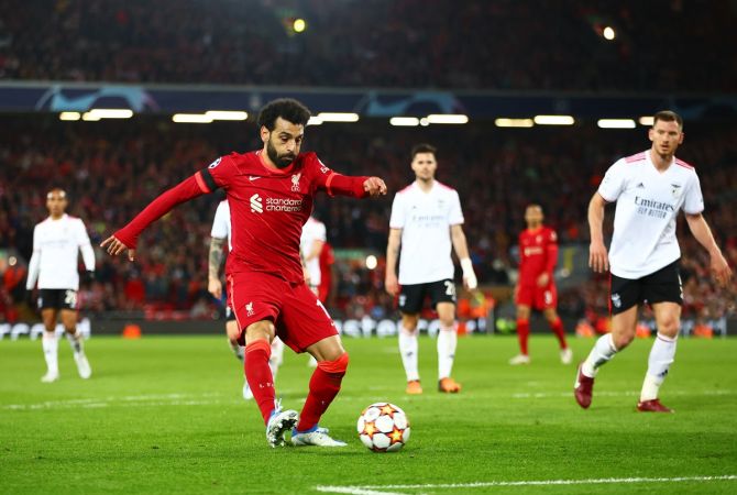 Liverpool's Mohamed Salah has an unsuccessful attempt on the Benfica goal.