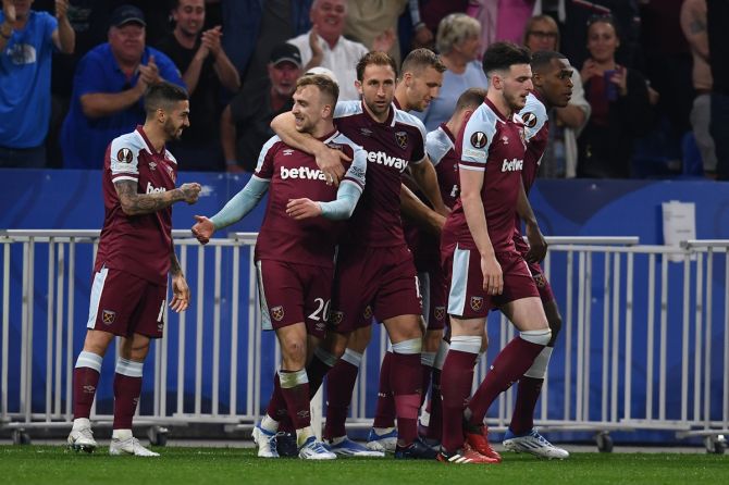 Jarrod Bowen is congratulated by teammates after scoring West Ham United's third goal.