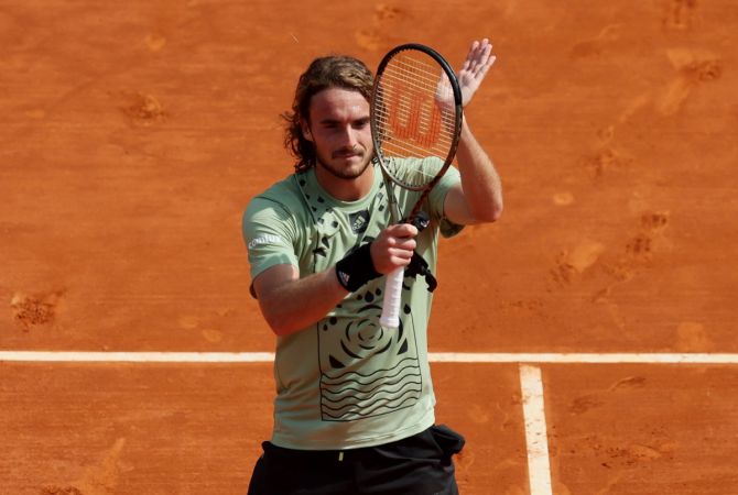 Greece's Stefanos Tsitsipas celebrates winning his third round match against Serbia's Laslo Dere at the Monte-Carlo Country Club, Roquebrune-Cap-Martin, France, on Thursday.