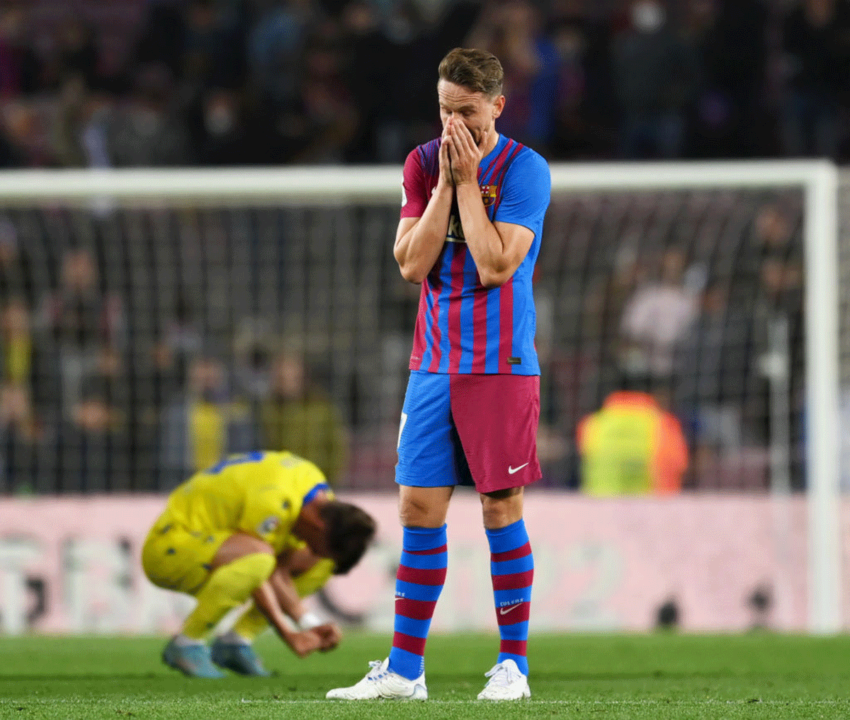 Barcelona's Luuk de Jong reacts after the final whistle of the La Liga match against Cadiz CF at Camp Nou in Barcelona on Monday
