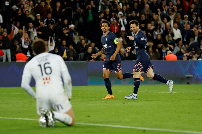 Lionel Messi celebrates scoring Paris St Germain's first goal with Marquinhos during the  Ligue 1 match against RC Lens, at  Parc des Princes, in Paris, France, on Saturday.