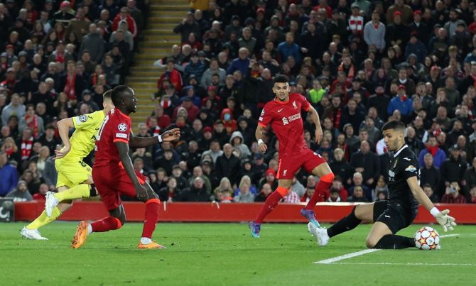 Sadio Mane places the ball past Villarreal goalkeeper Geronimo Rulli to score Liverpool's second goal during the Champions League semi-final first leg at Anfield, Liverpool, on Wednesday.