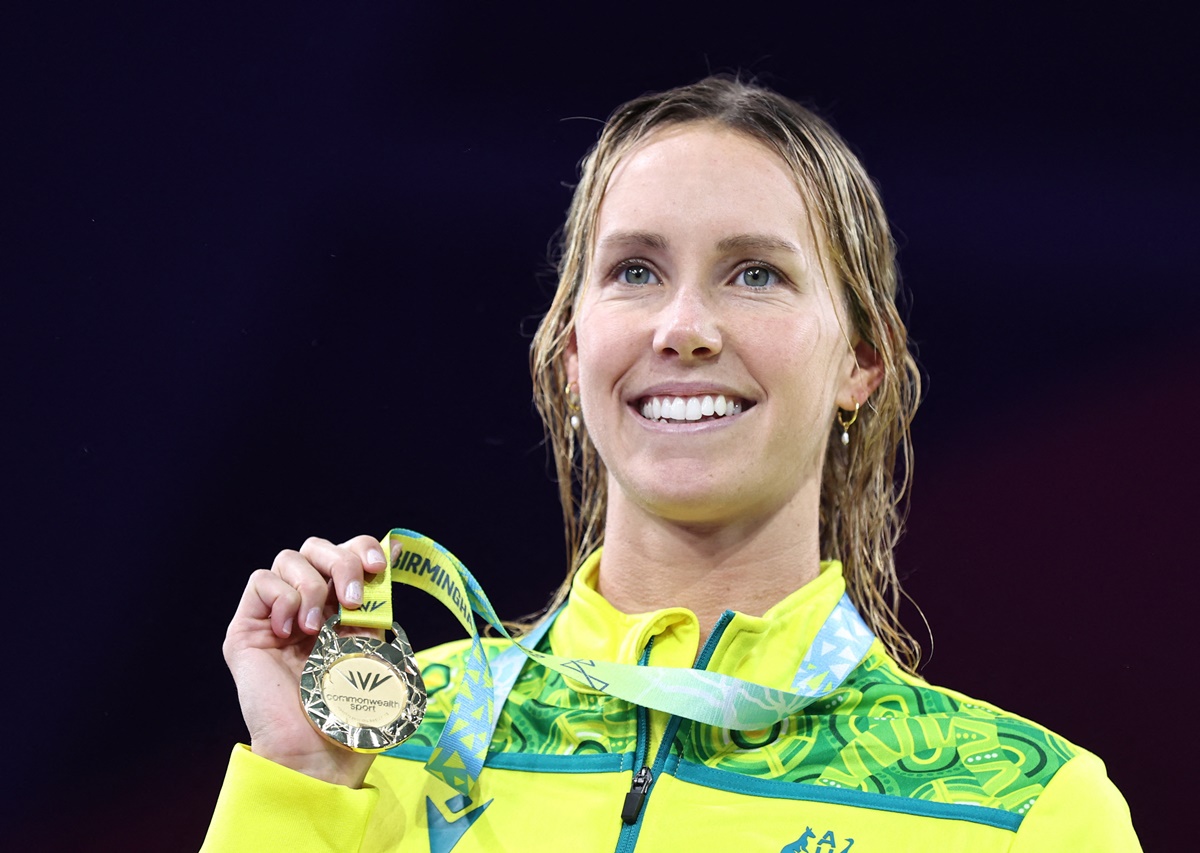 Australia's Emma McKeon celebrates on the podium after winning gold in the women's 50m freestyle at the Commonwealth Games, in Birmingham, on Sunday.