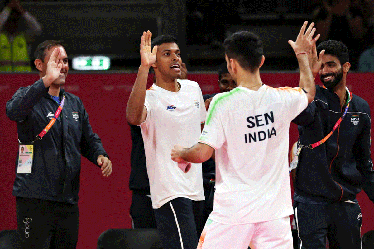 India's Lakshya Sen celebrates with teamates after winning during the Mixed Team Event semi-final Men's Singles match against Kean Yew Loh of Team Singapore on day four of the Birmingham 2022 Commonwealth Games at NEC Arena in Birmingham on Monday