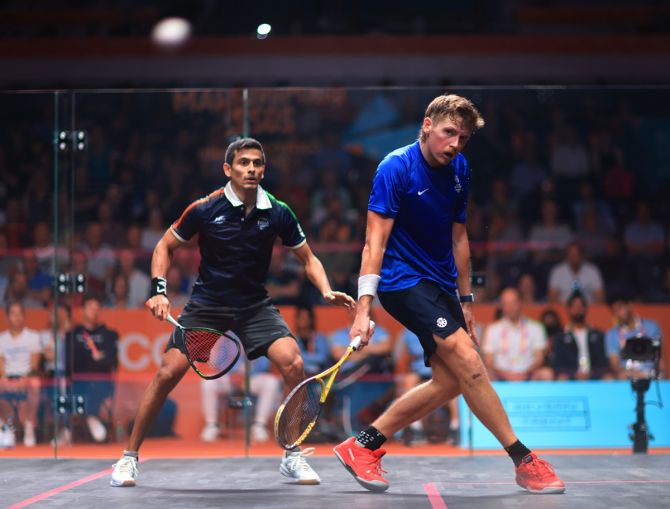 Saurav Ghosal in action against Scotland's Greg Lobban. All eyes will be on the Indian medal hope when he takes on New Zealand's Paul Coll in the men's semi-finals at the Commonwealth Games on Tuesday.