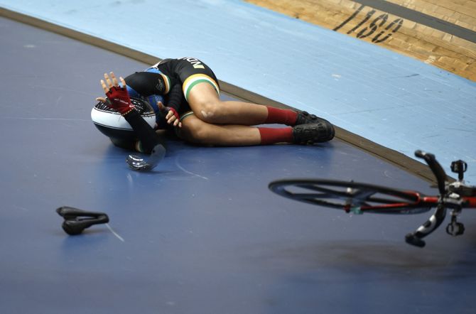 Indian cyclist Meenakshi reacts after falling from her bike during the Commonwealth Games women's 10km scratch race, at Lee Valley VeloPark, London, on Monday.