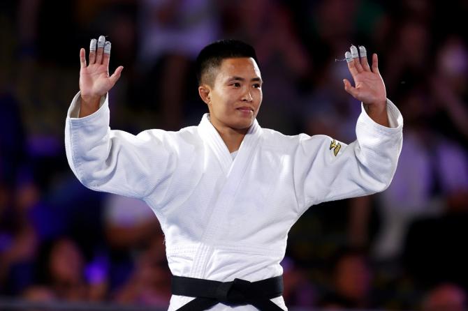 Silver medallist Shushila Devi Likmabam celebrates on the podium during the women's judo 48kg medal ceremony on Monday, Day 4 of the Commonwealth Games, at Coventry stadium.