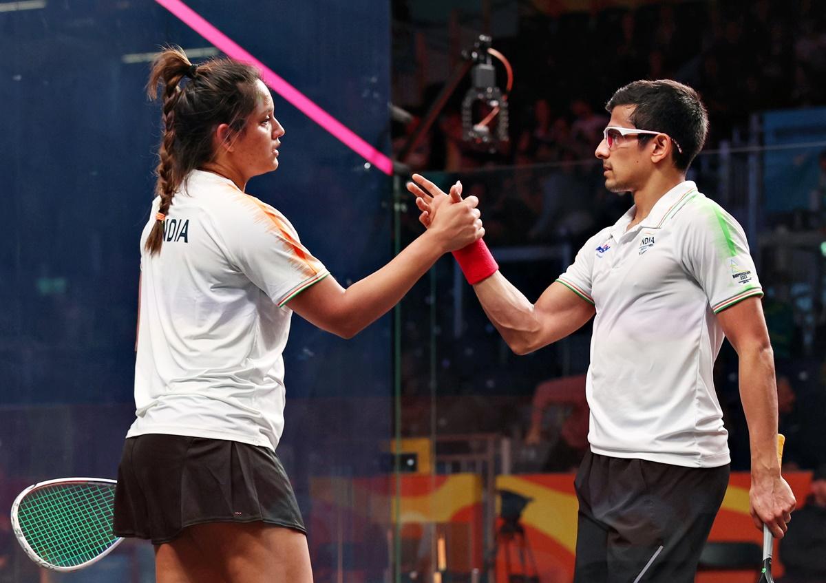 Dipika Pallikal Karthik and Saurav Ghosal celebrate winning their Commonwealth Games mixed doubles squash quarter-final against Australia's Rachael Grinham and Zac Alexander,  at the University of Birmingham Hockey & Squash Centre, on Friday.