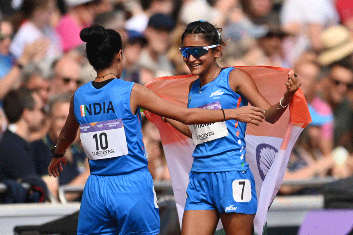 India's Priyanka Goswami celebrates with teammate Bhawna Jat after winning the silver medal in the Women's 10,000m Race Walk Final on day nine of the Birmingham 2022 Commonwealth Games at Alexander Stadium in Birmingham on Saturday