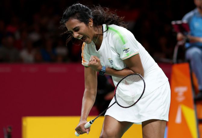 Pusarla Sindhu celebrates victory over Singapore's Yeo Jia Min in the semi-finals of the women's singles badminton at the Commonwealth Games on Sunday.