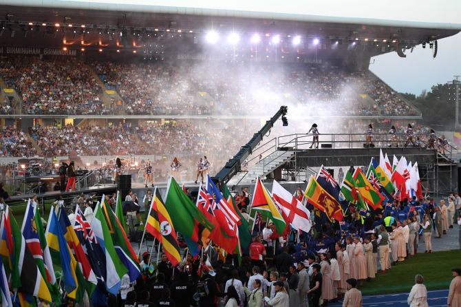 Athletes celebrate with flags of their respective countries during the Closing Ceremony.
