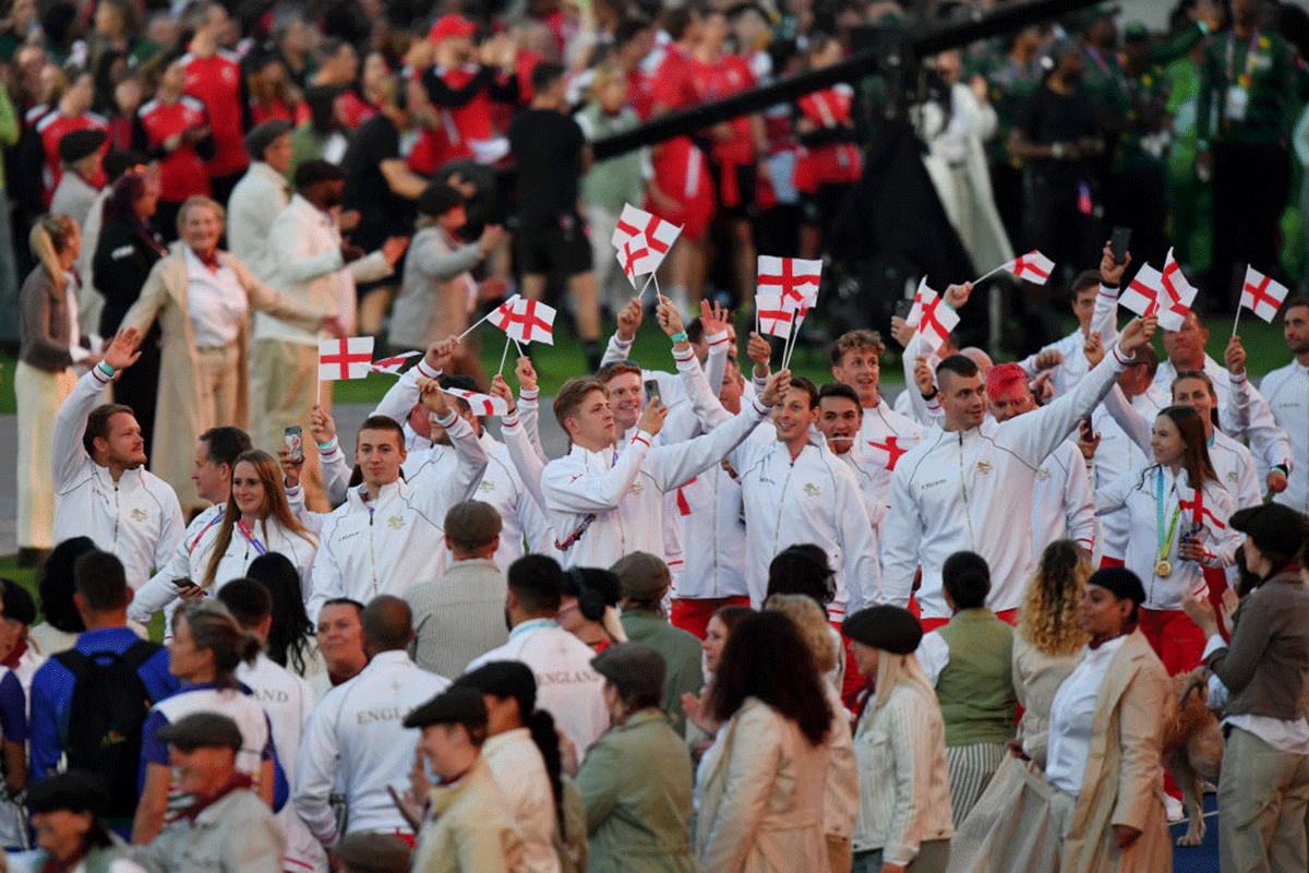 England's athletes wave to the crowd at the closing parade  