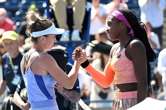 Romania's Simona Halep, left, shakes hands with Coco Gauff after their quarter-final.