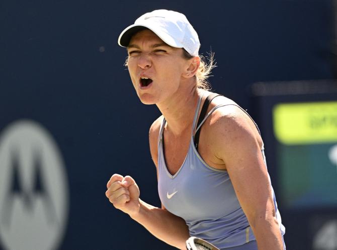 Romania's Simona Halep celebrates victory over Jessica Pegula of the United States in the semi-finals of the Canadian Open, at Sobeys stadium, in Toronto, on Saturday.