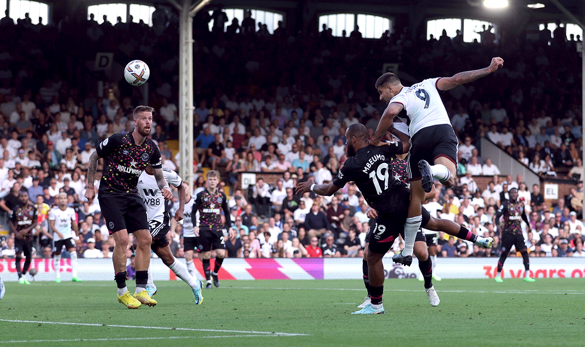 Fulham's Aleksandar Mitrovic scores their third goal against Brentford at Craven Cottage 