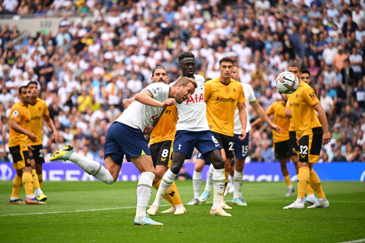 Tottenham Hotspur's Harry Kane scores their side's first goal against Wolverhampton Wanderers at Tottenham Hotspur Stadium in London on Saturday