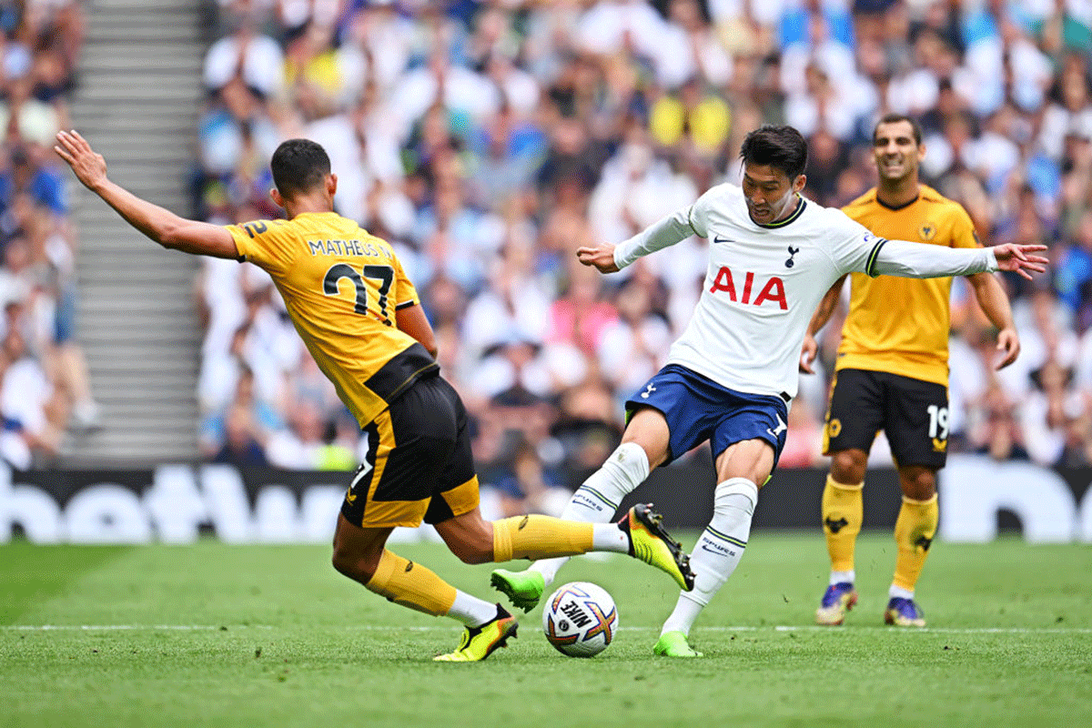 Tottenham's Son Heung-Min battles for possession with Wolverhampton Wanderers' Matheus Nunes 