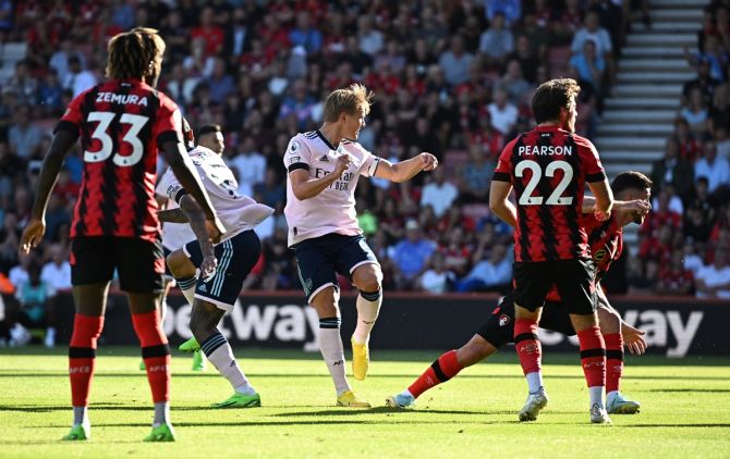 Martin Odegaard scores Arsenal's second goal during the Premier League match against  Bournemouth, at Vitality Stadium, Bournemouth, on Saturday.