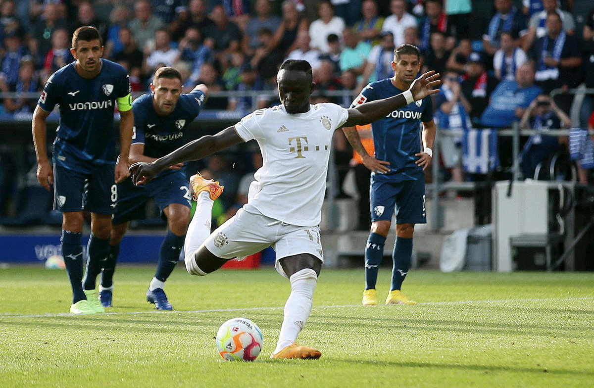 Bayern Munich's Sadio Mane scores their fifth goal from the penalty spot against VfL Bochum during their Bundesliga match at Stadion An der Alten Forsterei, Bochum, Germany 