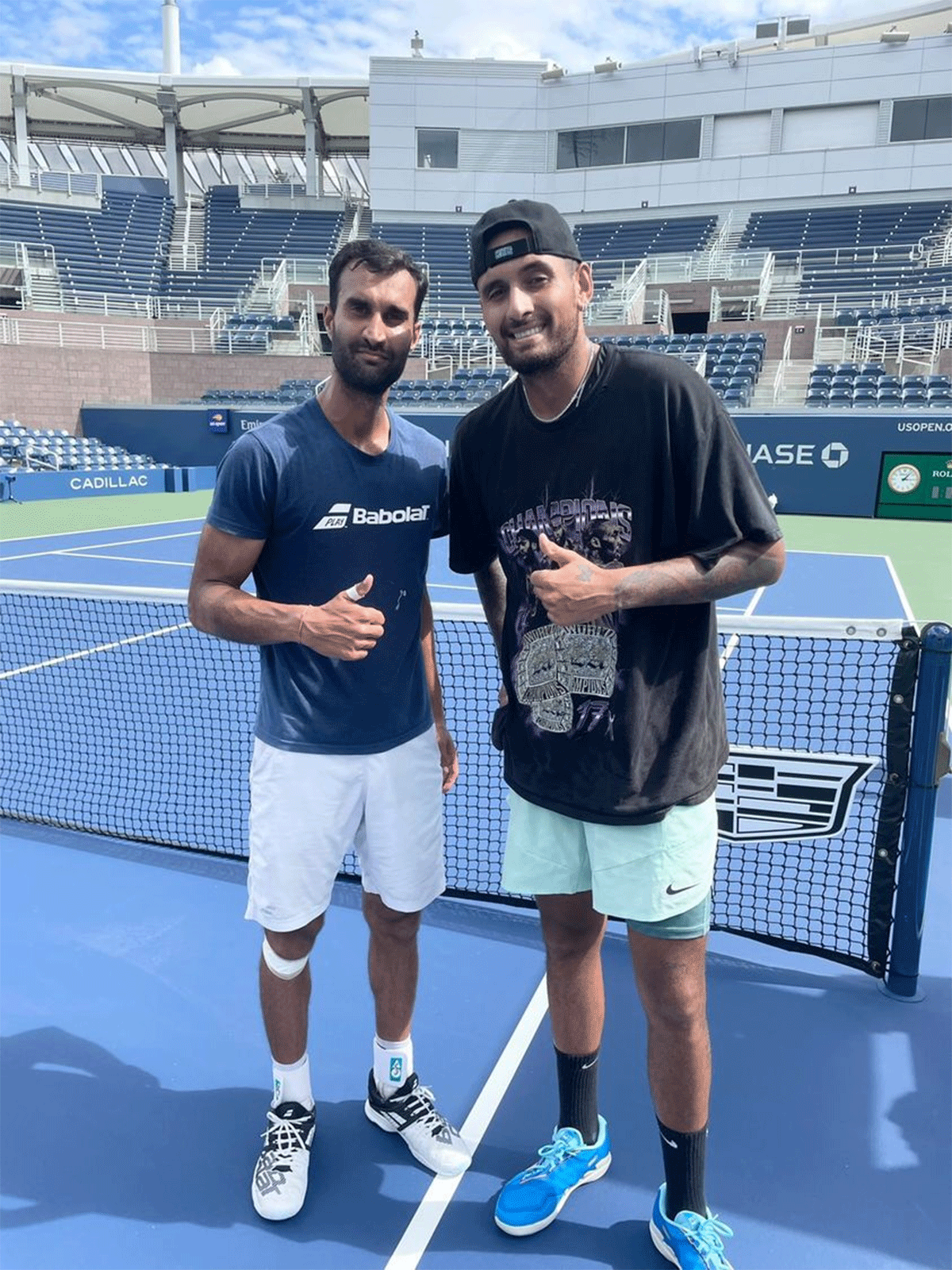 India's Yuki Bhambri with World No 26 Nick Kyrgios after a practice session