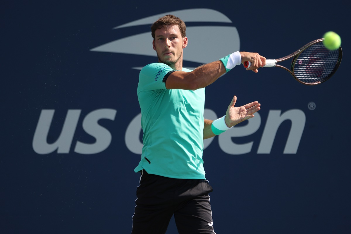 Spain's Pablo Carreno Busta plays a forehand against Austria's Dominic Thiem.