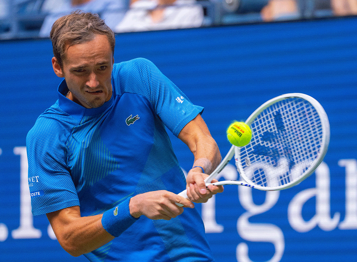 Daniil Medvedev returns against American Stefan Kozlov in their first round match